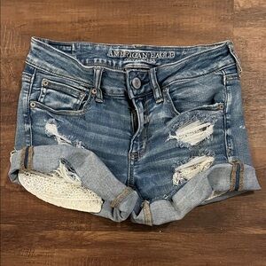 American Eagle Outfitters Blue Distressed Lace-Trim Roll Cuff Jean Shorts
